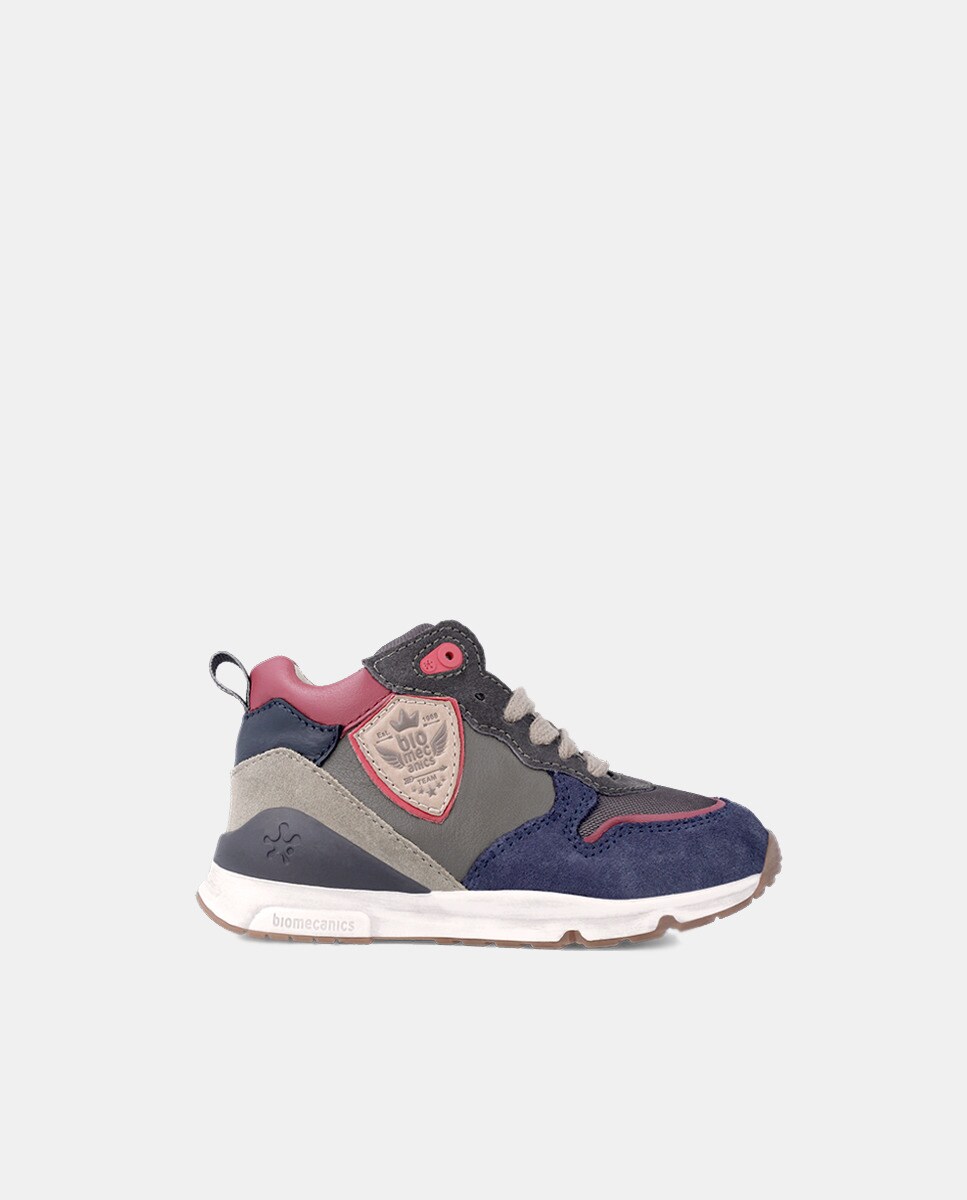 Chaussures basses style running zippées avec détail écusson