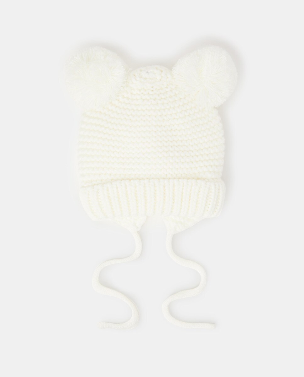 Bonnet en maille à pompons