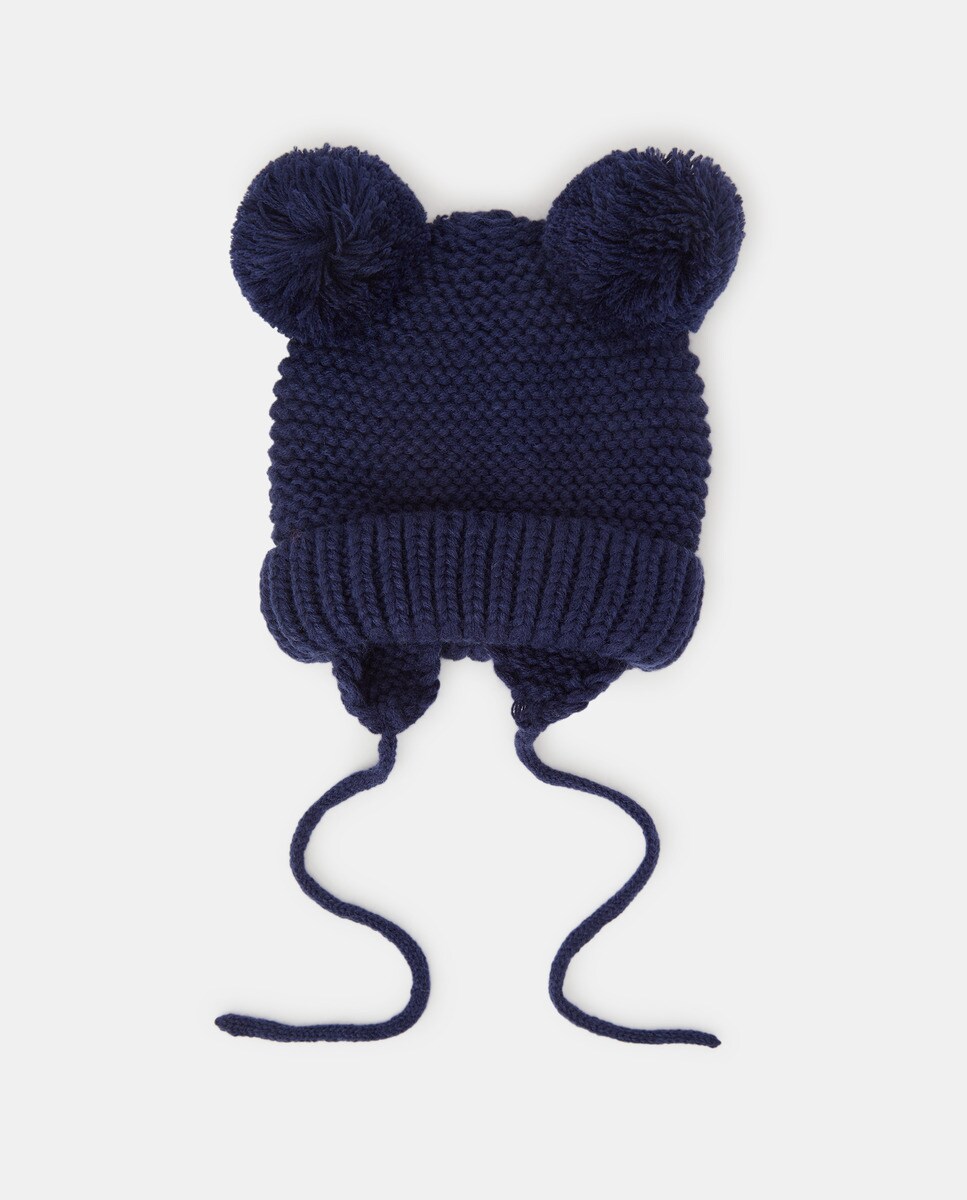 Bonnet en maille à pompons