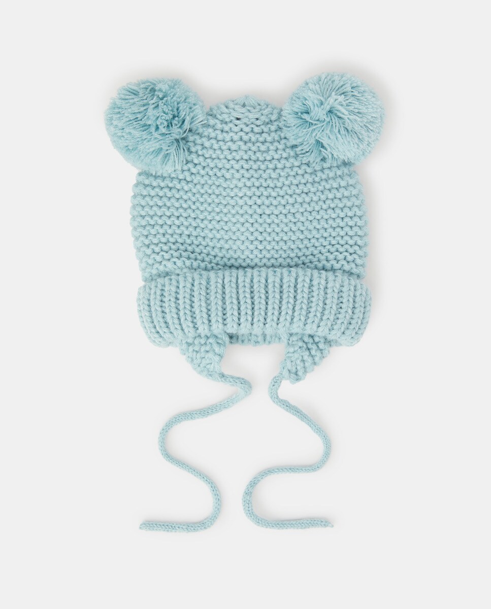 Bonnet en maille à pompons