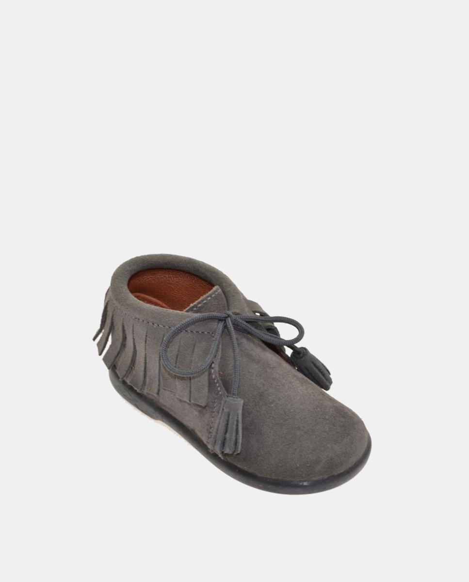 Chaussures montantes en croûte de cuir à franges et lacets