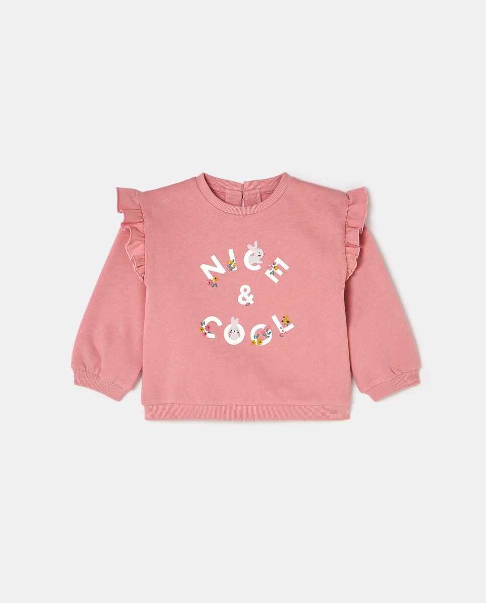 Sweat avec volant sur les épaules et inscription au centre