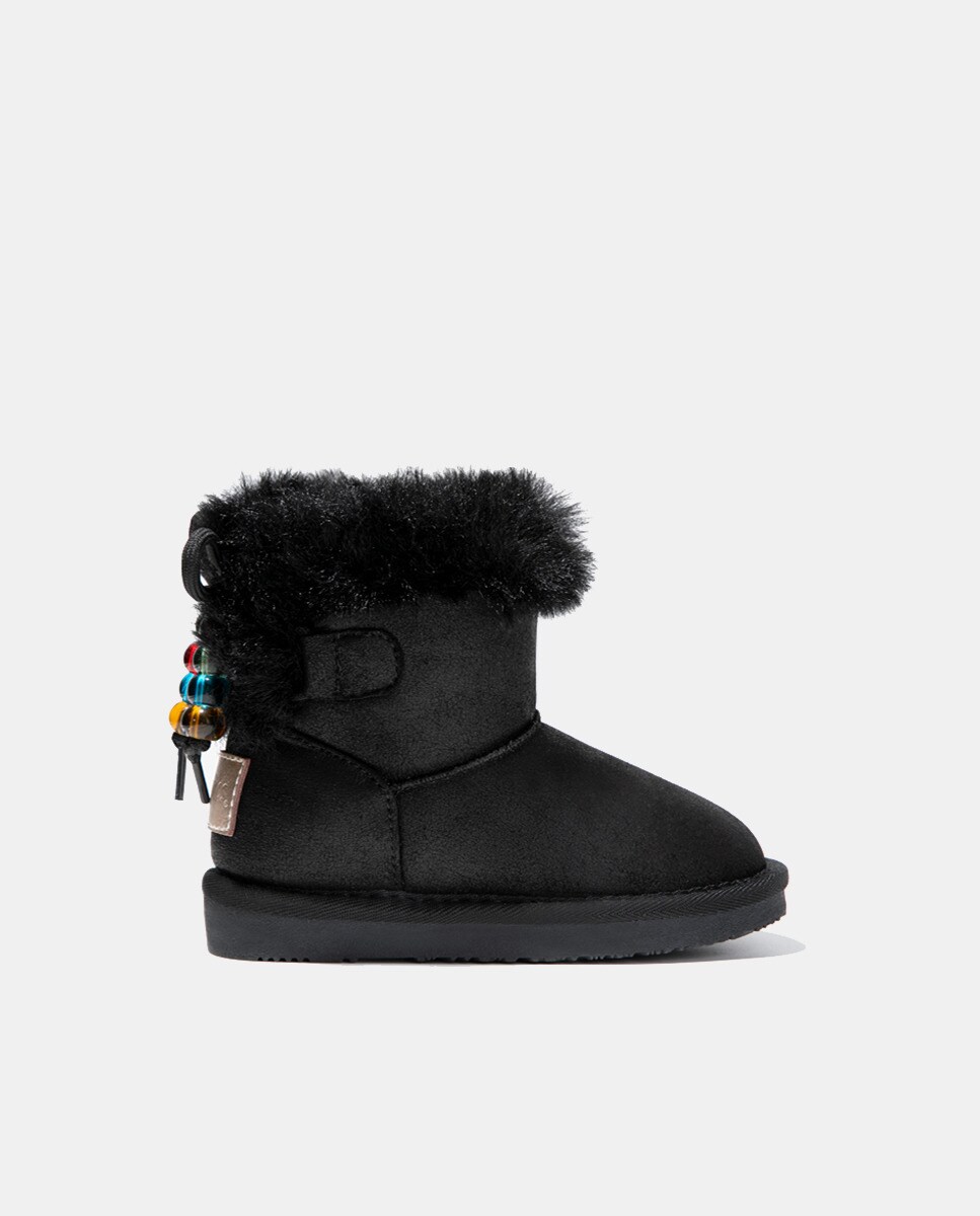 Bottes fille avec rebord en fourrure et pompons multicolores