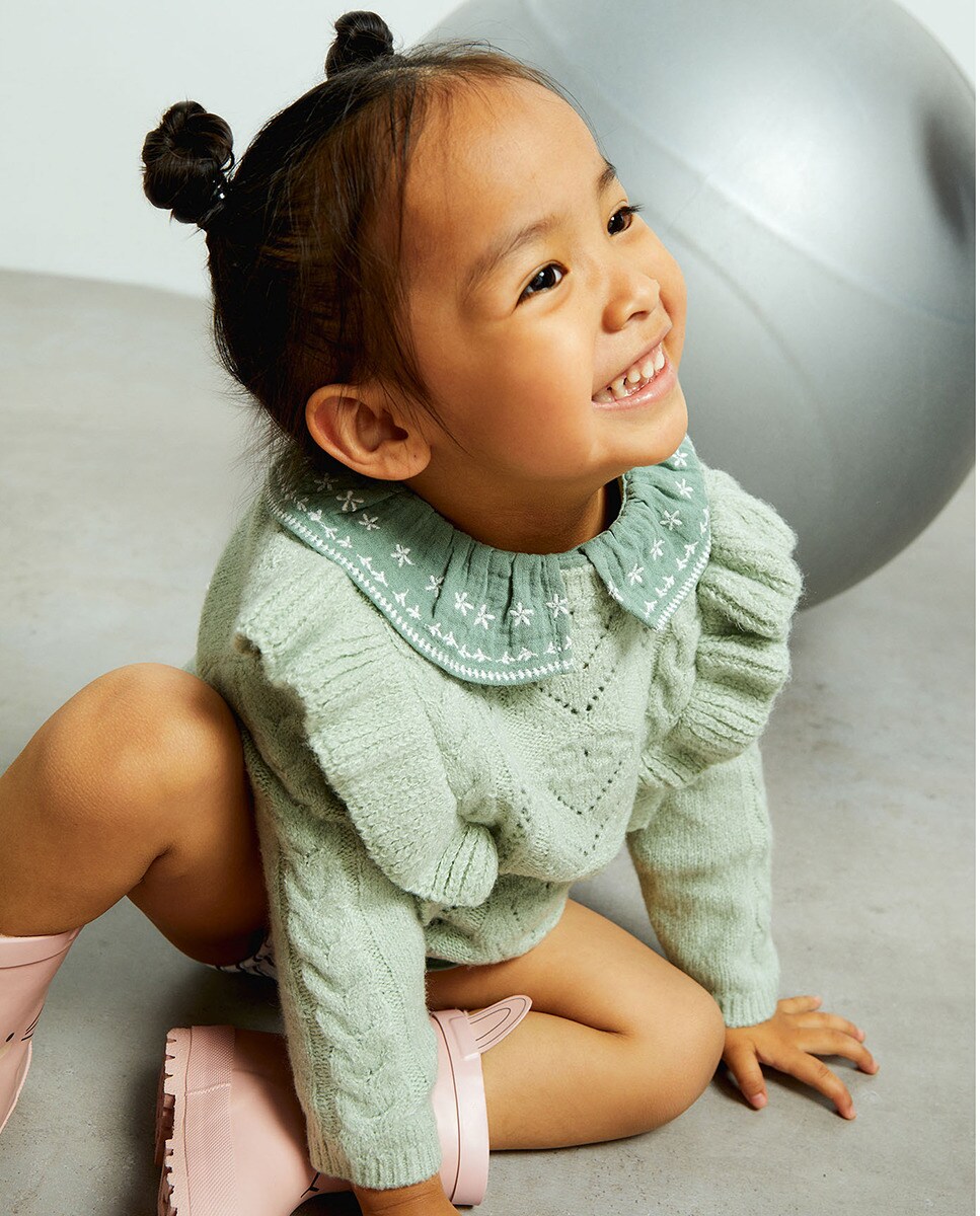 Pull bouclette volant