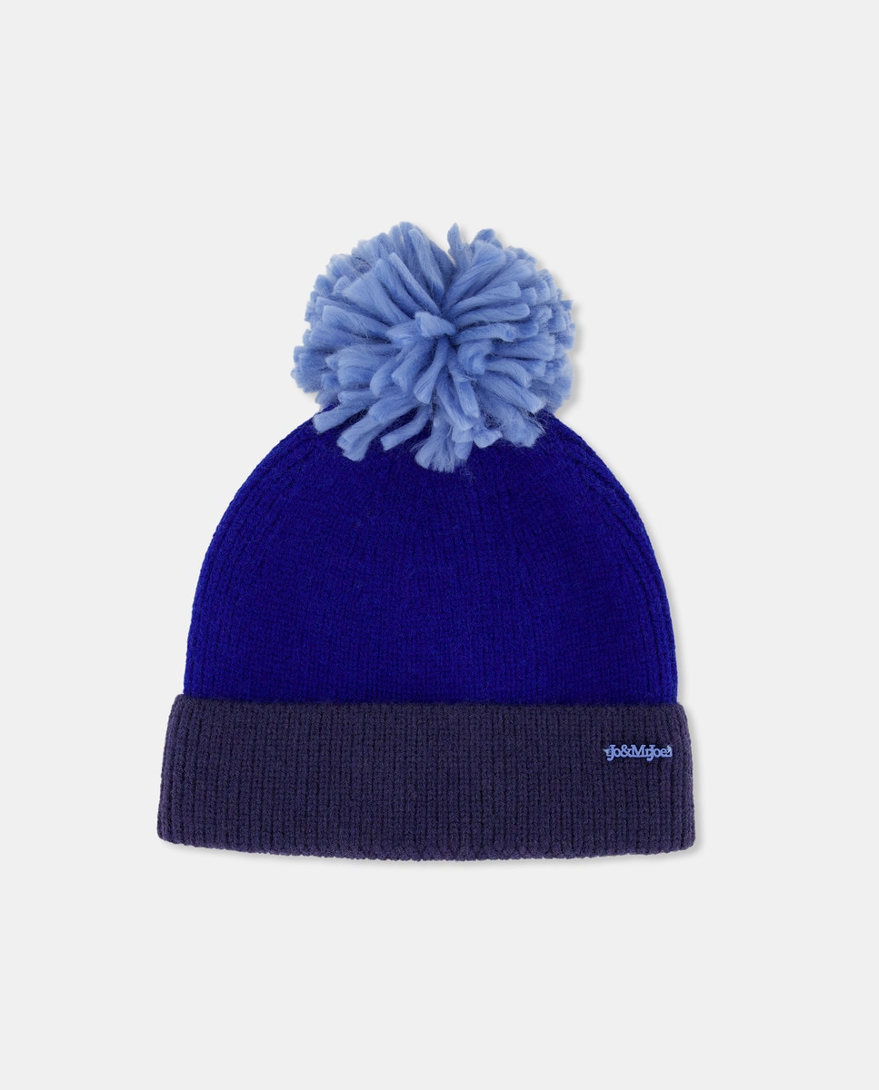 Bonnet en maille à pompon