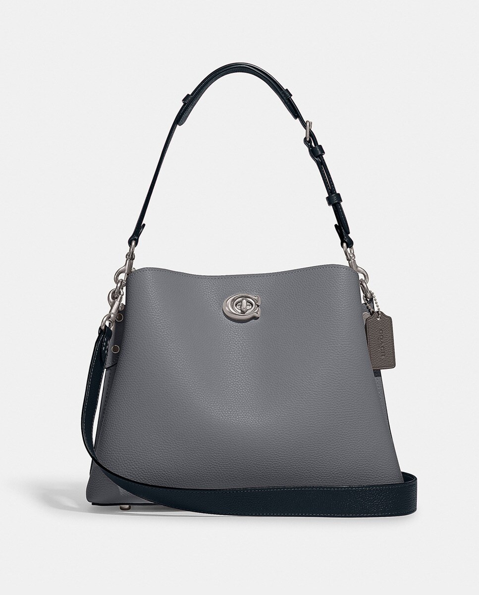 Sac porté épaule avec fermoir et anse supplémentaire