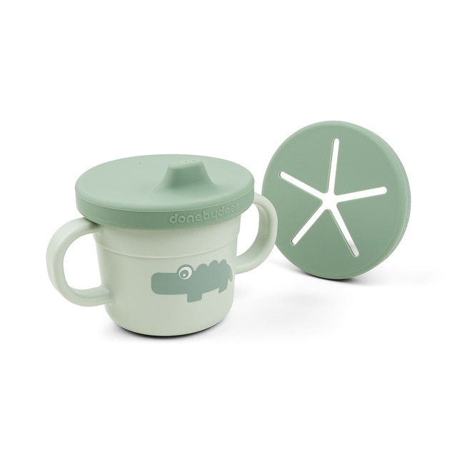 Imagem 0 de Caneca antiderrapante de aprendizagem e porta snacks com pegas Done by Deer Coleção Foodie
