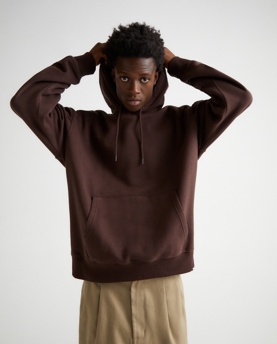 Sweat à capuche uni