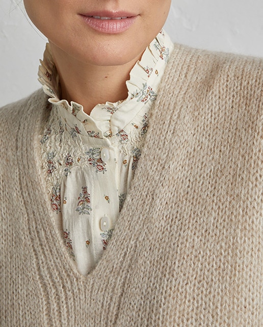 Imagen 0 de Chaleco de punto con cuello pico de mujer