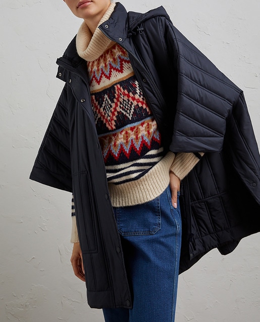 Imagen 0 de Poncho de mujer liso con capucha