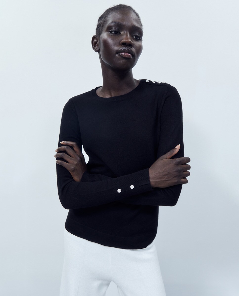 Pull applique boutons