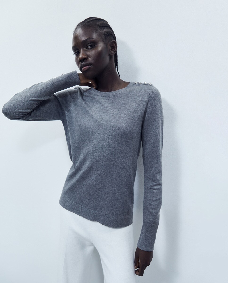 Pull applique boutons