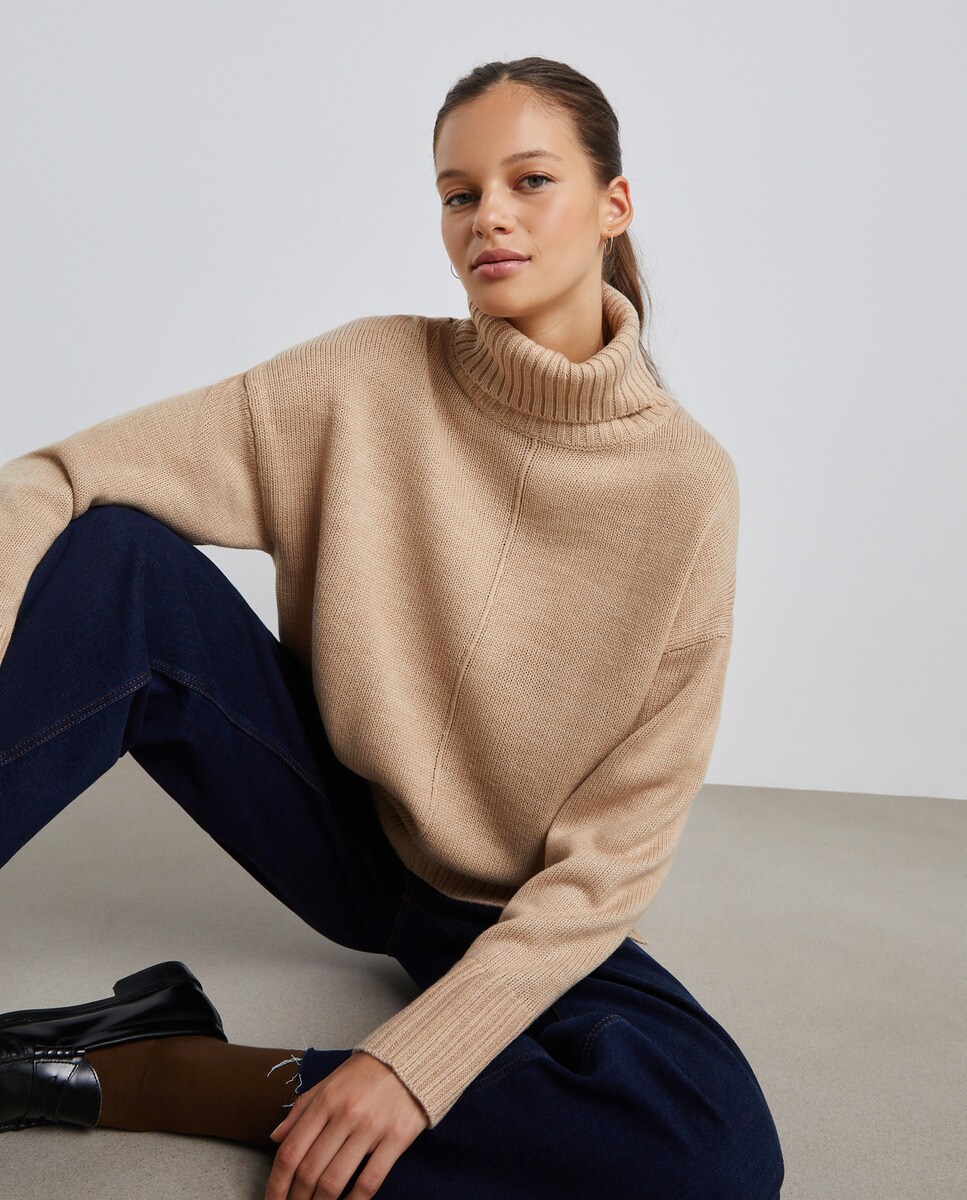 Pull col roulé
