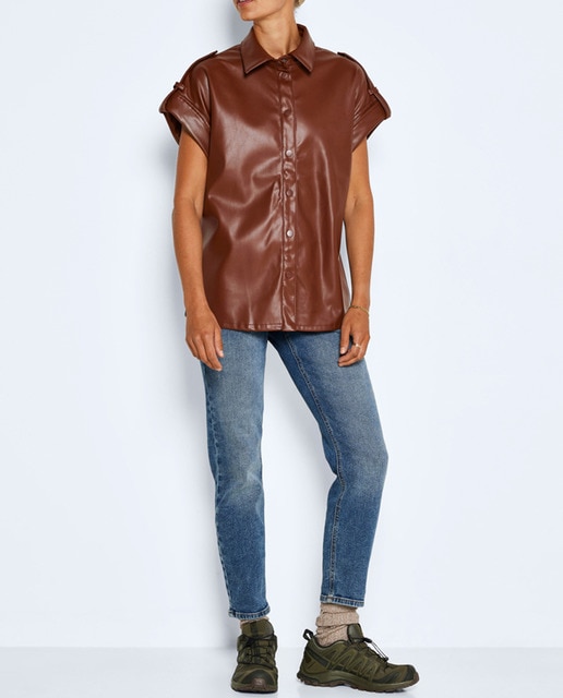 Imagen 0 de Camisa de mujer corta de polipiel