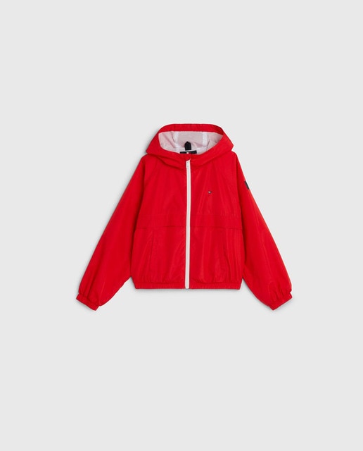 Imagen 0 de Chaqueta de niña con capucha y cremallera, bolsillos delanteros y logo bandera