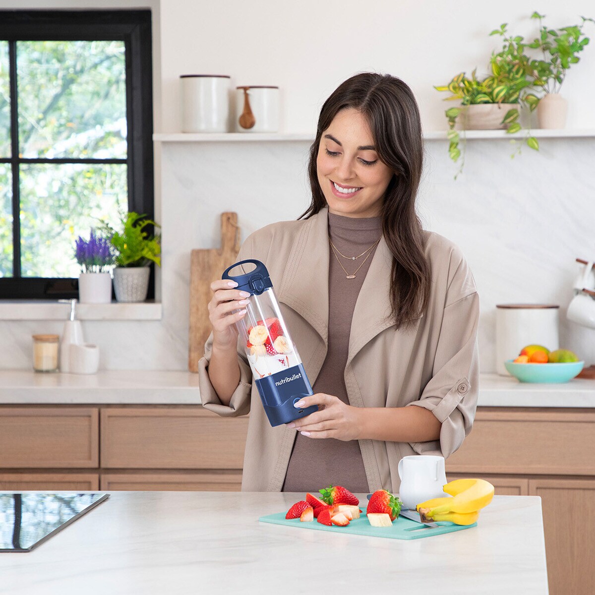Batidora personal Nutribullet Portable NBP003NBL con carga USB Navy-7