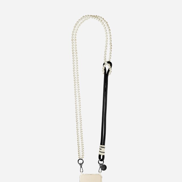 Imagen 0 de Cadena de joyería Gigi 120 cm de perlas blancas y cordón negro con mosquetones negros