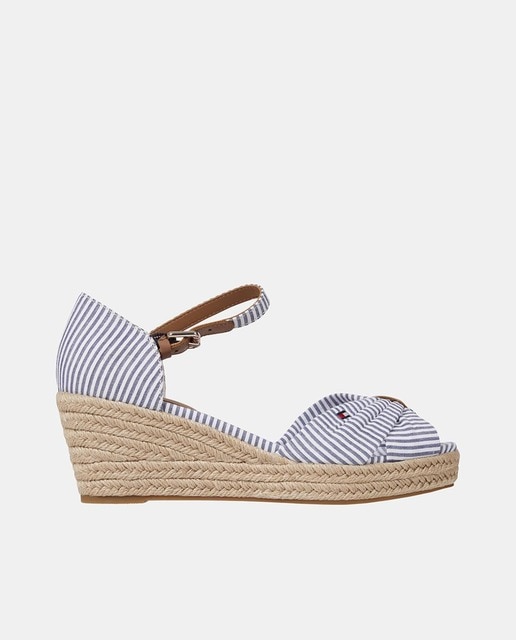 Imagen 0 de Alpargatas de mujer en azul claro con cuña estampado de rayas y diseño en forma de lazo