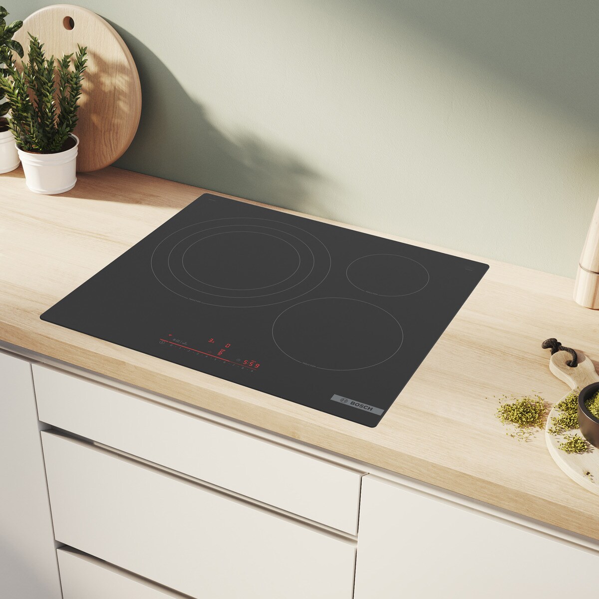 Placa de inducción Bosch con 3 zonas de cocción, sin perfiles - PID61RHB1E Negro-3