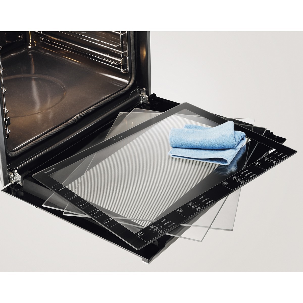 Cocina compacta Electrolux 60 cm, placa vitrocerámica con 4  zonas y horno eléctrico - Acero Inox-4