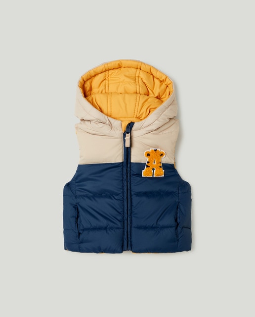 Imagen 0 de Chaleco reversible con cortes de bebé niño