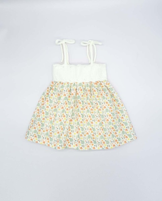 Imagen 0 de Vestido cuerpo de tricot crudo y falda de hojas