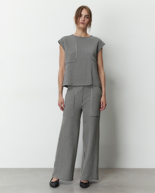 Pantalones Chinos Sfera Mujer Pantalón Chino Efecto Piel · Sfera