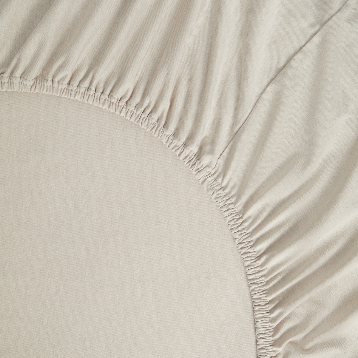 Sábana bajera ajustable Jersey Liso Basics El Corte Inglés Beige-2
