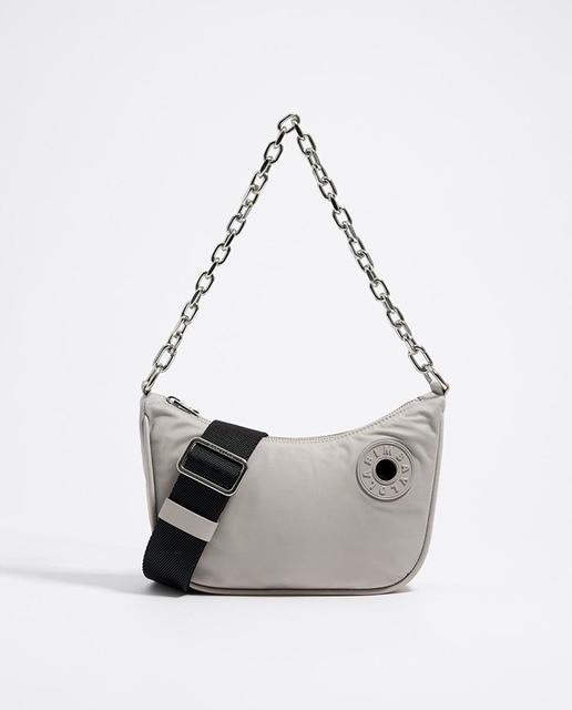 Imagen 0 de Bolso bandolera de tejido técnico en forma de media luna