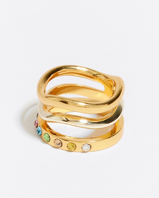 Imagen 0 de Anillo ancho en color dorado con tres bandas de metal
