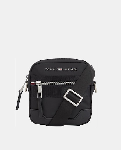 Imagen 0 de Bandolera ovalada negra con letras de Tommy Hilfiger metalizadas