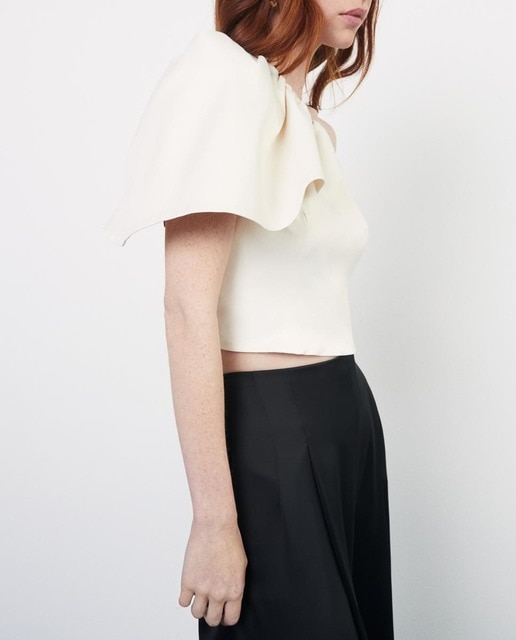 Imagen 0 de Blusa sin mangas asimétrica lisa