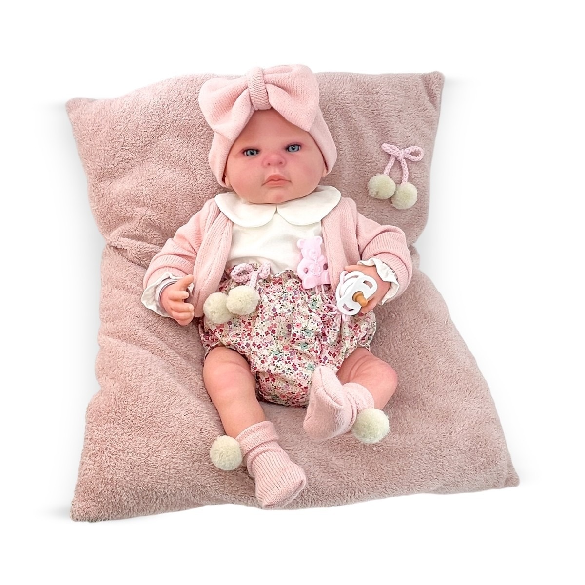 Imagem 0 de Boneca Reborn 50 cm com Casaco Rosa Mecnismo Beijinho e Almofada Rosa