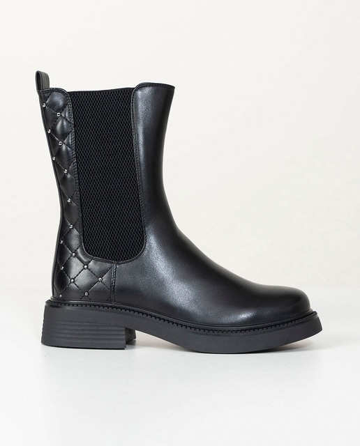 Imagen 0 de Bota plana con tachuelas de mujer