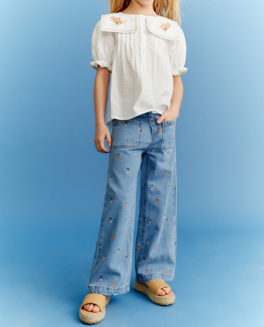 Imagen 0 de Vaquero de niña wide leg con bordado floral