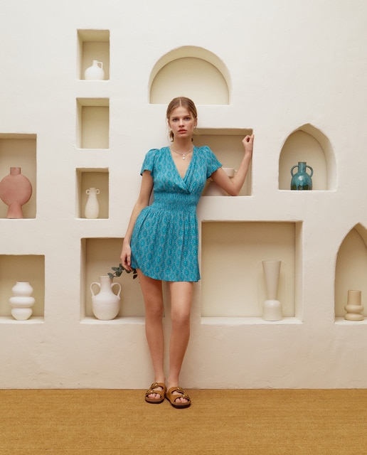 Imagem 0 de Vestido Curto Cruzado com Elásticos