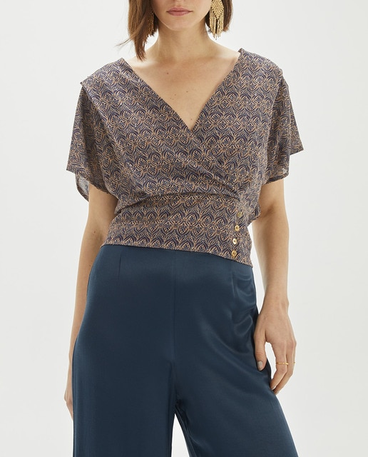 Imagen 0 de Top estampado lurex con delantero cruzado de mujer
