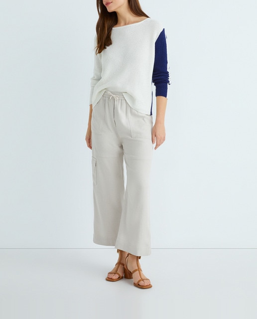 Imagen 0 de Pantalón ancho con cortes y bolsillos mujer