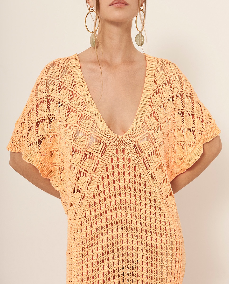 Imagen 0 de Vestido con manga caída acompañado de un escote en pico