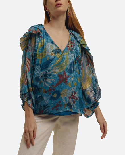 Blusa asimétrica con tejido lurex de mujer — oferta en Primeriti