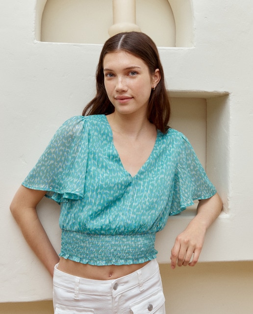 Imagen 0 de TOP DE MANGA CORTA Y DETALLE DE TACHAS