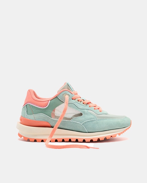 Imagen 0 de Sneakers amarillas con tejido de rejilla para mujer