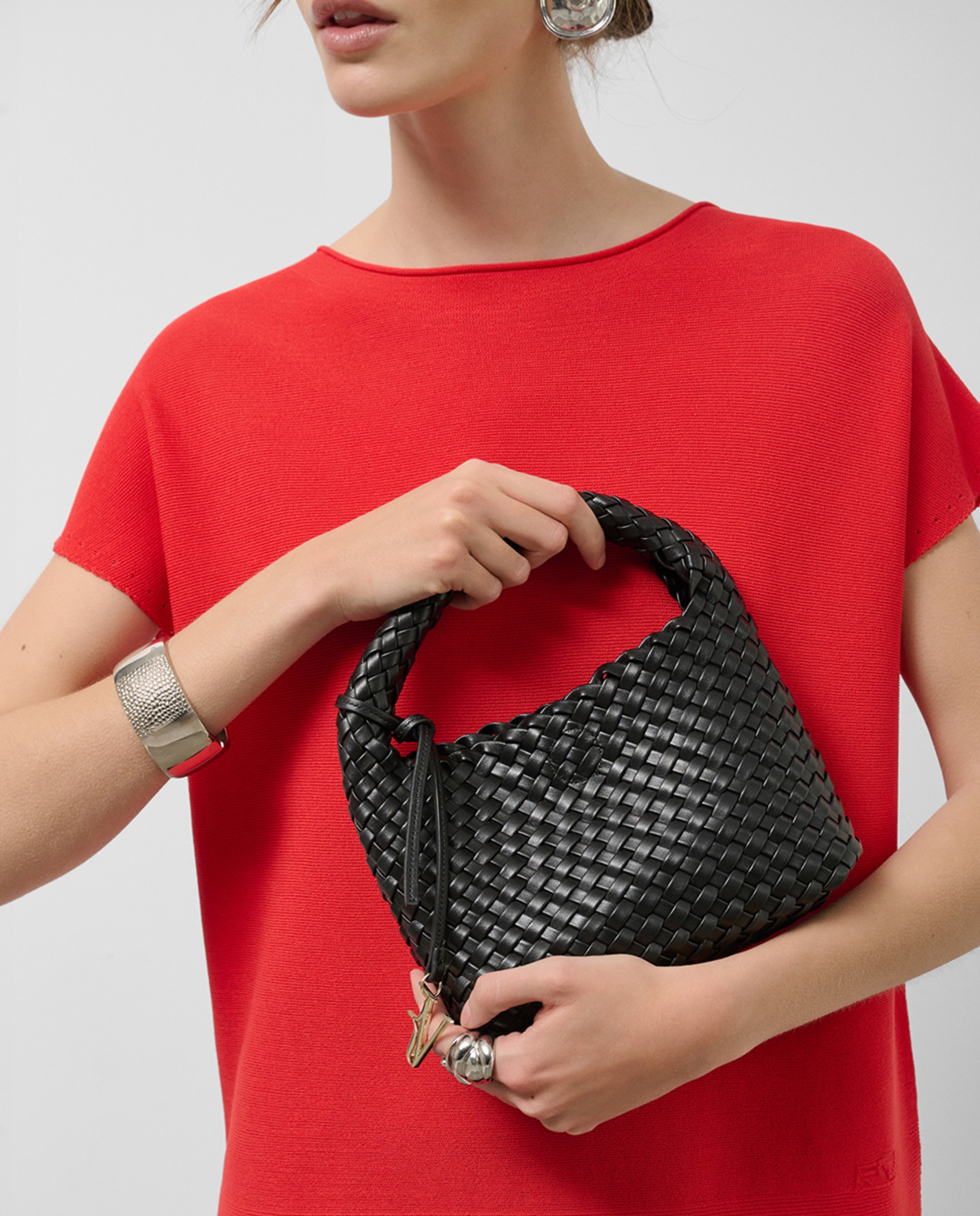 Bolso de mujer de mano Paula Clutch piel trenzada · Roberto Verino