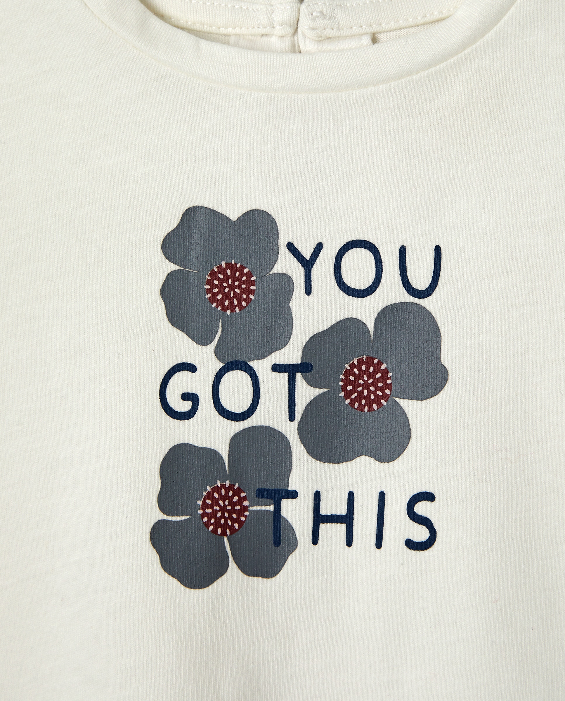 Camiseta bebé solidaria Blanco roto-3