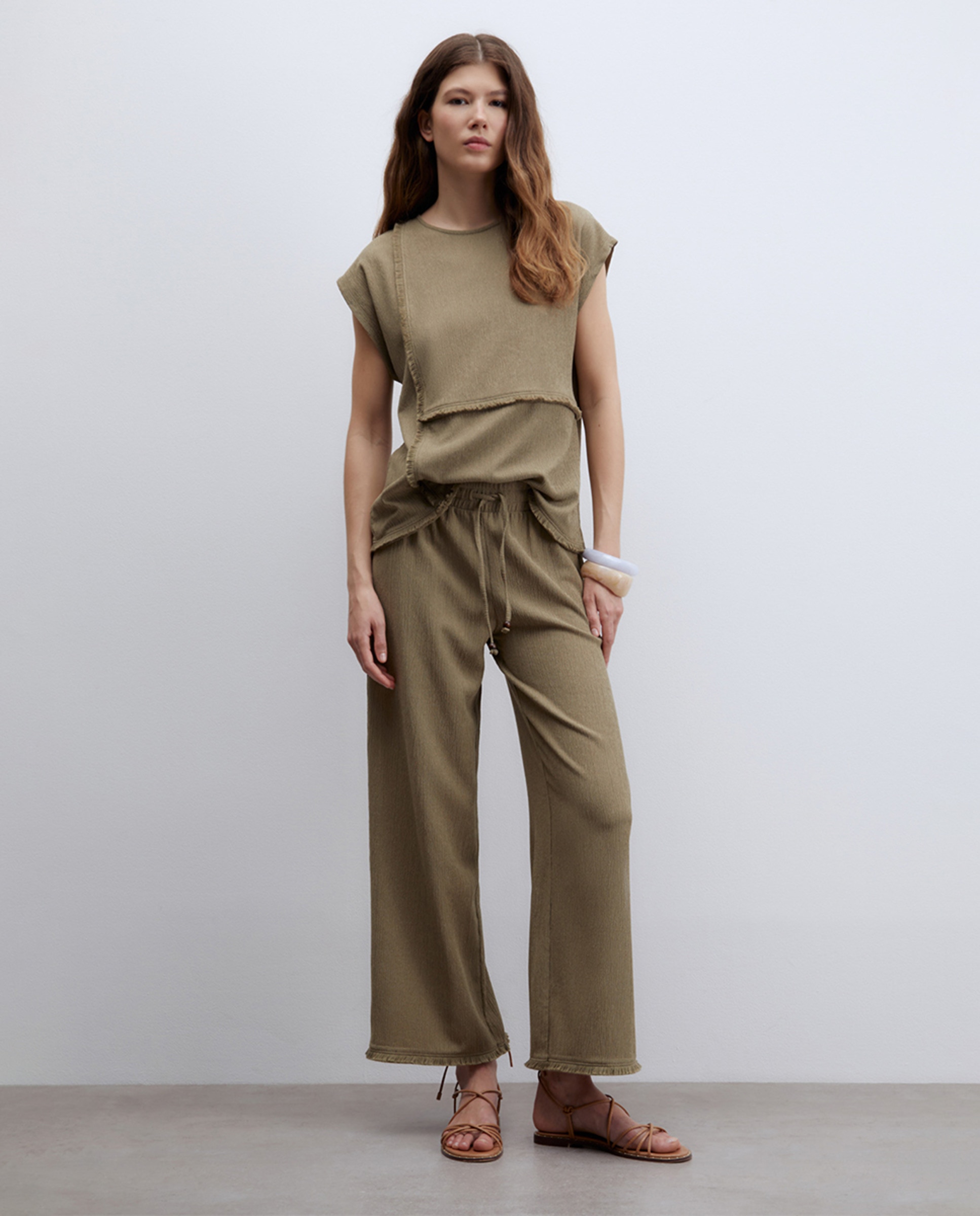 Pantalón textura flecos · Sfera · El Corte Inglés