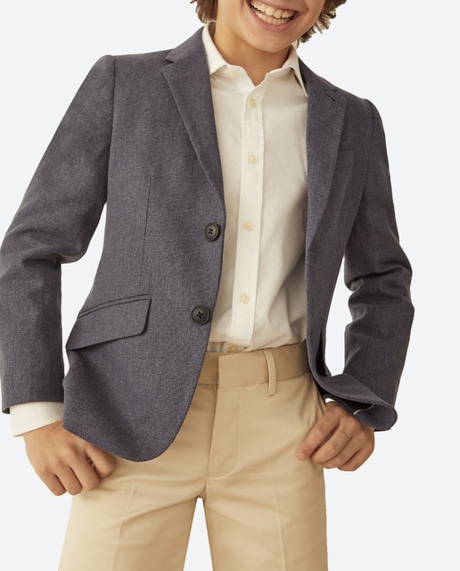 Imagen 0 de Americana de lino con textura fantasía y cierre de botón