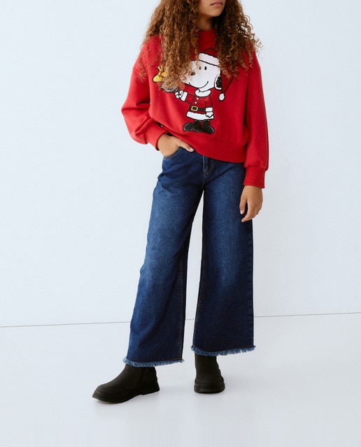 Imagen 0 de Pantalón denim wide leg bajo desflecado con rotos de niña