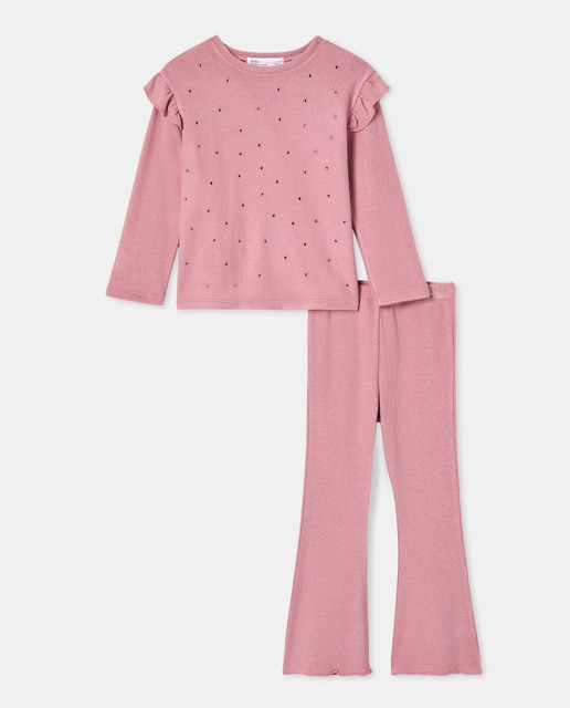 Imagem 0 de Conjunto de Malha Cortado com Top com Strass e Folho e Calças Flare