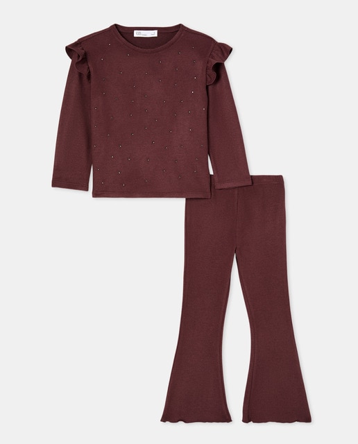 Imagem 0 de Conjunto de Malha Cortado com Top com Strass e Folho e Calças Flare