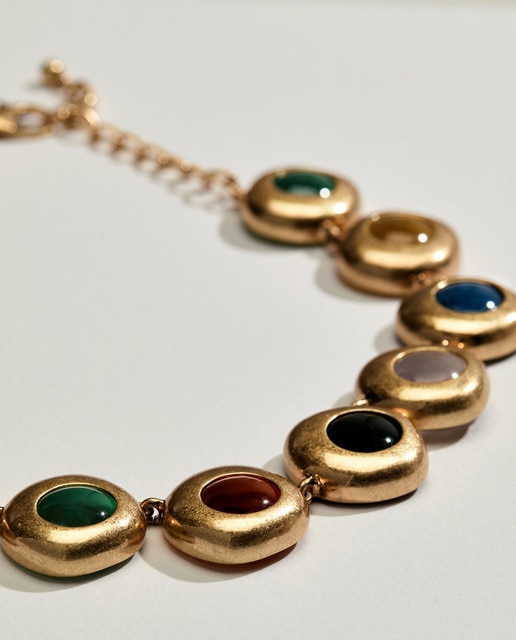 Imagen 0 de Collar dorado piedras engastadas